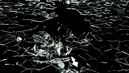 Image showing Shattered or demolished glass over black 