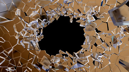 Image showing Shattered glass: sharp Pieces and hole on black