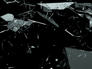 Image showing Many pieces of shattered glass over black