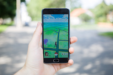 Image showing Moscow, Russia - August, 02: Android user play in Pokemon Go aug