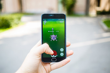 Image showing Moscow, Russia - August, 02: Android user play in Pokemon Go aug