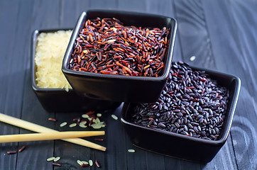 Image showing raw rice in bowls