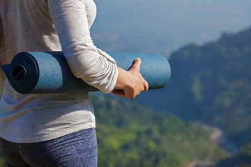 Image showing Woman standing with yoga 