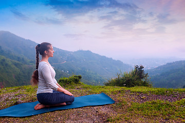 Image showing Woman doing Yoga asana Virasana Hero pose