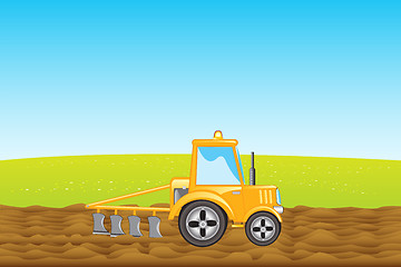 Image showing Tractor plows land in field