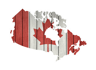 Image showing Map With Wooden Flag Of Canada