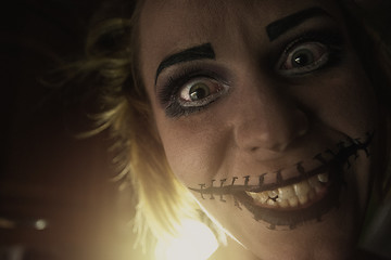 Image showing Horrible girl with scary mouth and eyes