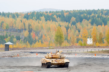 Image showing Modernized tank T-90S in action