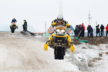 Image showing Jump of sportsman on snowmobile