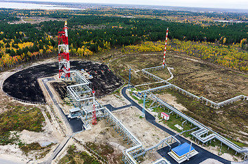 Image showing Torches for associated gas burning of oil plant