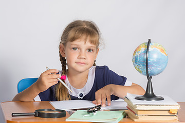 Image showing Schoolgirl on geography lesson