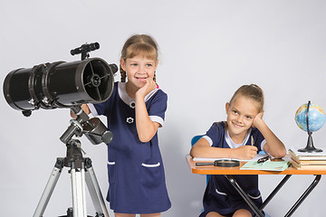 Image showing Two girls mysteriously astronomers thinking