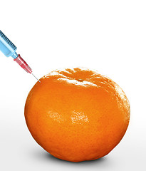 Image showing syringe sticked into orange,GMO