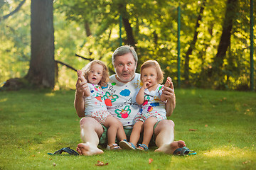Image showing Portrait Of Grandfather With Granddaughters