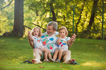 Image showing Portrait Of Grandfather With Granddaughters