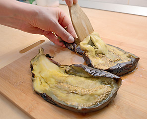 Image showing Unskin roasted eggplants