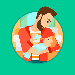 Image showing Father feeding baby.