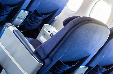 Image showing Empty old airplane seats in the cabin, selective focus