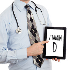 Image showing Doctor holding tablet - Vitamin D