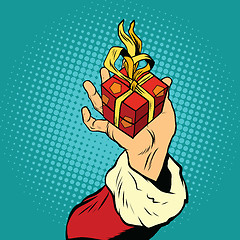 Image showing Hand of Santa Claus with gift