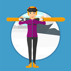 Image showing Woman holding skis.