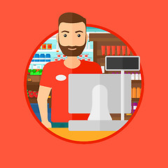 Image showing Cashier standing at the checkout in supermarket.