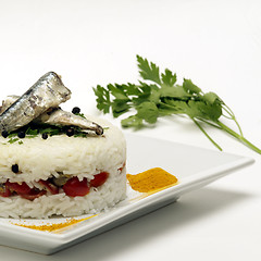 Image showing rice tarte with anchovies and tomatoes filling