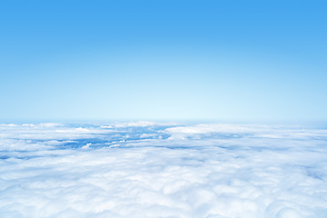 Image showing flight over the clouds background