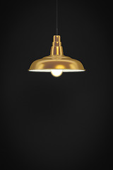 Image showing golden lamp in front of a dark wall