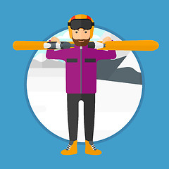 Image showing Man holding skis.