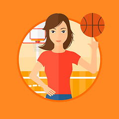 Image showing Basketball player spinning ball.