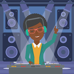 Image showing Smiling DJ with console.