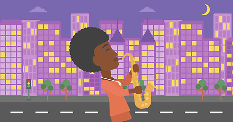 Image showing Woman playing saxophone.