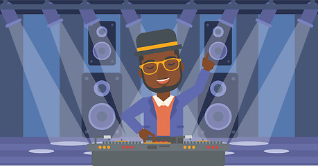 Image showing Smiling DJ with console.