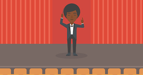 Image showing Conductor directing with baton.