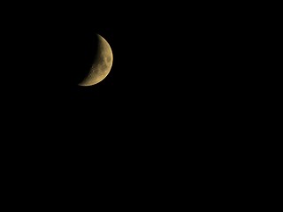 Image showing First quarter moon sepia