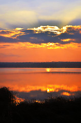 Image showing Sunrise over the lake early in the morning with beautiful clouds