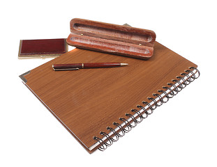 Image showing wooden notebook with pen isolated