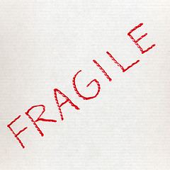 Image showing White corrugated cardboard with fragile text