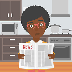 Image showing Woman reading newspaper.