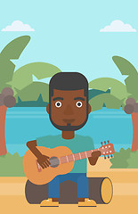 Image showing Man playing guitar.