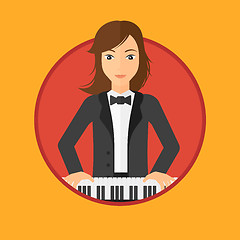 Image showing Woman playing piano.