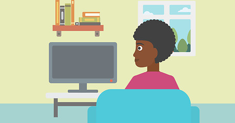 Image showing Woman watching TV.