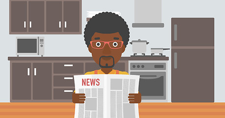 Image showing Man reading newspaper.