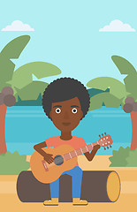 Image showing Woman playing guitar.