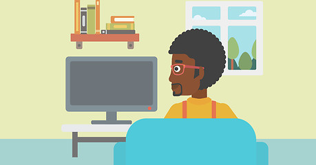 Image showing Man watching TV.