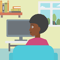 Image showing Woman watching TV.