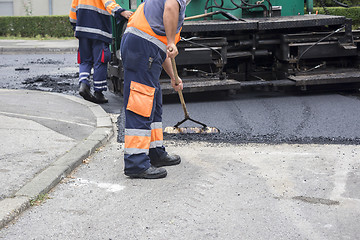 Image showing Workers on Asphalting road 