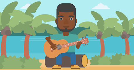 Image showing Man playing guitar.