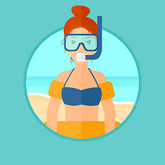 Image showing Woman with snorkeling equipment on the beach.